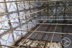 Sediment accumulation inside a water tank altering internal conditions