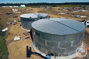technician monitoring a water storage system